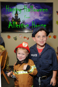 Hometown heroes (l to r) Fireman Gavin Jackson, age 3, gets into the spirit with Cameron French, age 6, who is dressed as a policeman.