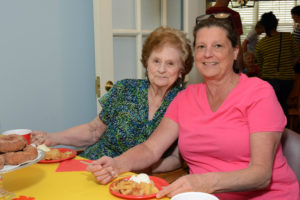 Resident Doris Wheeling enjoys time with her daughter Cindy Capello.